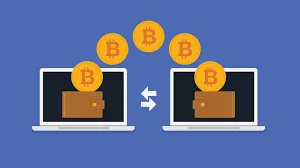 Illustration of Bitcoin coins moving between two laptop wallets